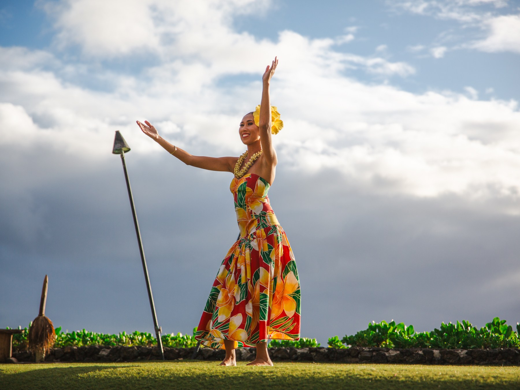 Women with Arms Raised Dancing a Kauai Luau